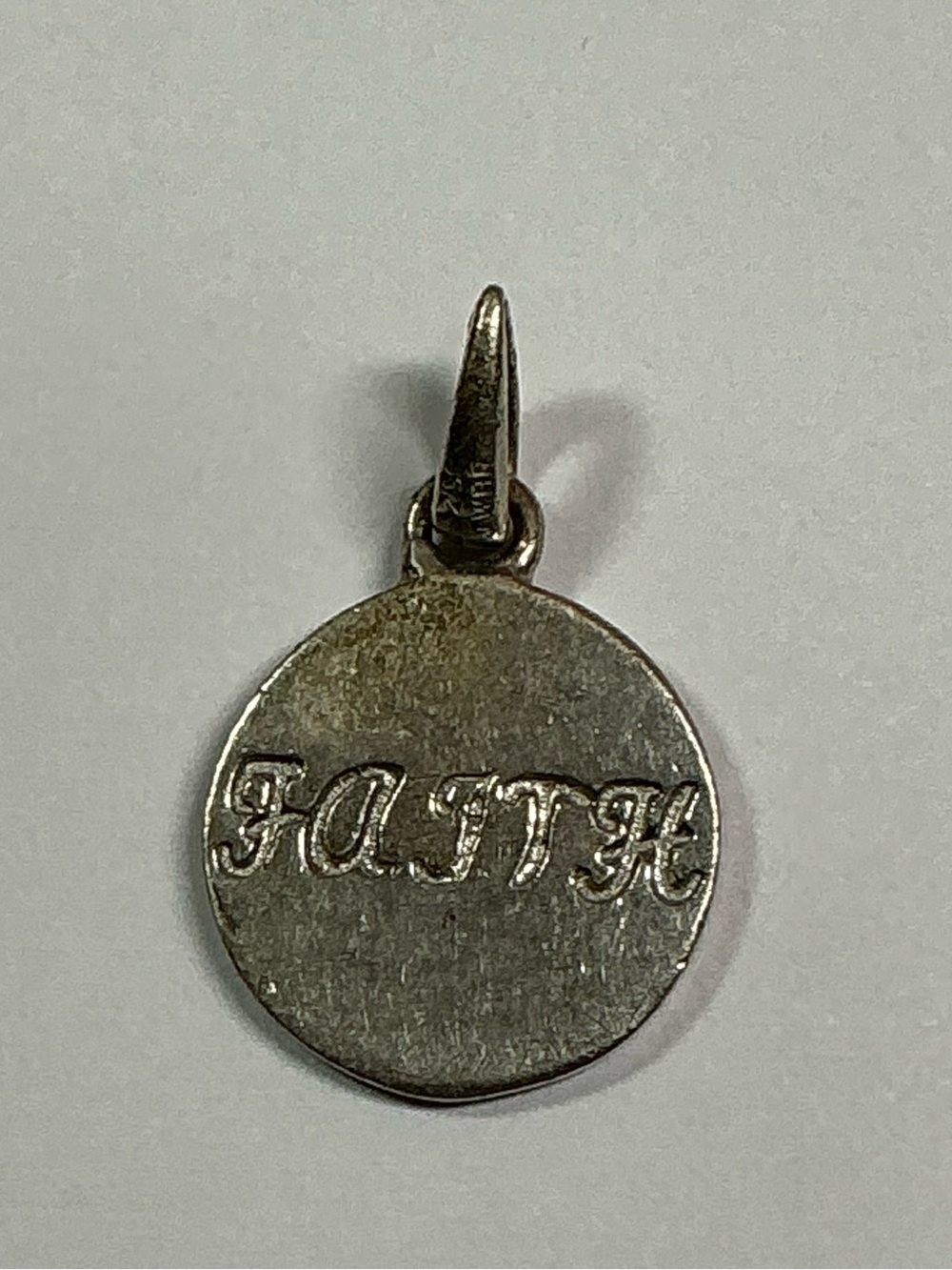 JWBR Sterling Silver Solid Round Pendant with the word Faith. 1/2” diameter